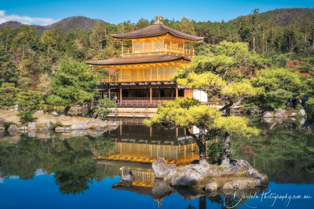 Golden Pavilion with reflections in the pool in Kyoto